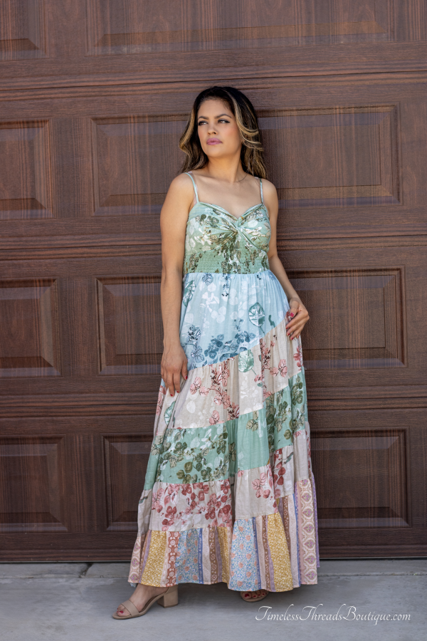 "Sage Ethnic Floral Sweetheart Maxi Dress from Timeless Threads Boutique featuring a vibrant ethnic floral print and a romantic sweetheart neckline, perfect for adding boho-chic elegance to any occasion."