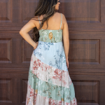 "Sage Ethnic Floral Sweetheart Maxi Dress from Timeless Threads Boutique featuring a vibrant ethnic floral print and a romantic sweetheart neckline, perfect for adding boho-chic elegance to any occasion."