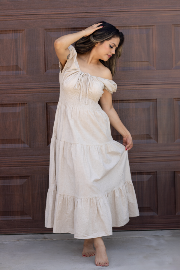 "Serena Cotton Linen Soft Washed Maxi Dress with a tie front that scrunches the bust area, pockets, and versatile off-shoulder design, offering a chic and comfortable look."