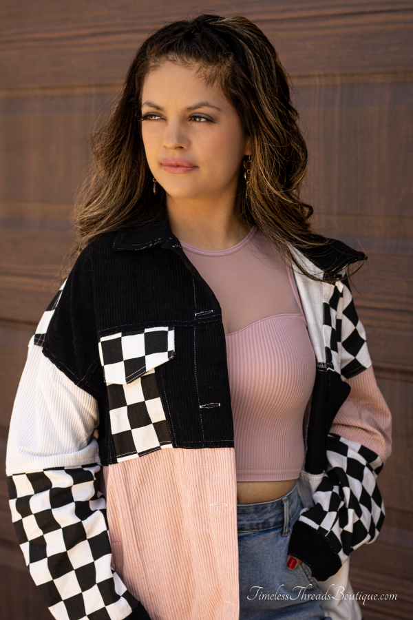 Chloe Color Block Corduroy Jacket in white, black, and pink with checkered contrast, showcasing bold color blocks and soft corduroy fabric.