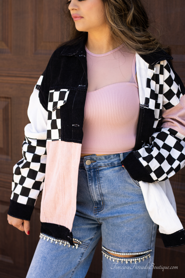 Chloe Color Block Corduroy Jacket in white, black, and pink with checkered contrast, showcasing bold color blocks and soft corduroy fabric.