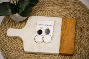 Ariana Earrings - Black, featuring a sleek black finish and unique silhouette, perfect for adding elegance to any outfit. Available at Timeless Threads Boutique.