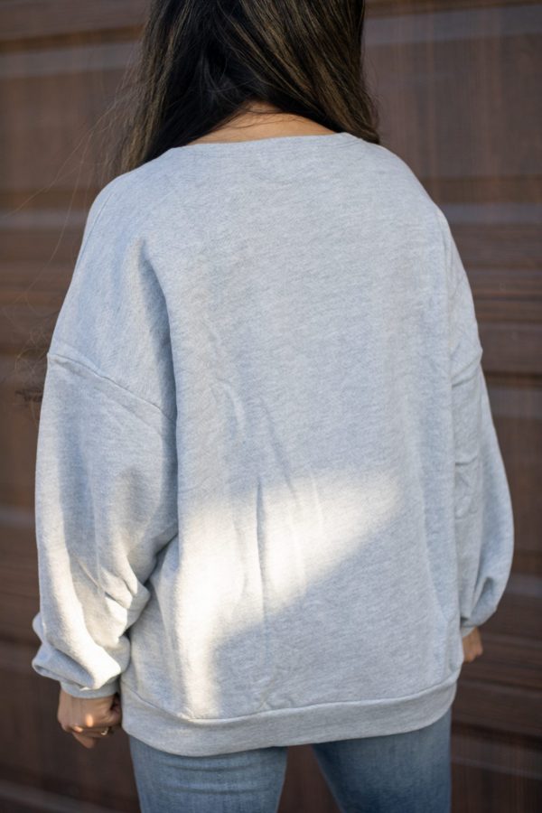 “Grey terry sweater with bold red Paris lettering – The Camille Paris Sweater from Timeless Threads Boutique”
