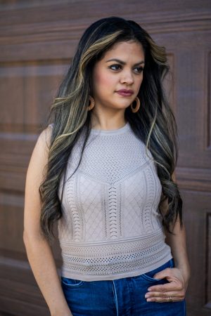 Latte-colored fine gauge tank with pointelle detailing and mixed knit textures displayed on a hanger.